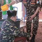 Ketua PCNU Sampang Rela Basah – Basah Dalam Mengikuti Baiat Banser