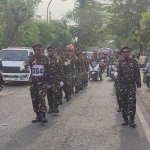 Banser dan Fatayat NU Dukun Semangat Ikuti Gerak Jalan Semarak HUT ke-80 RI