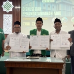 Ansor Jawa Timur dan Universitas Al-Qolam Malang Tandatangani MoU Gerakan Desa Maslahah